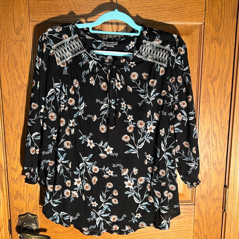 Sheer floral fabric
3/4 length sleeves